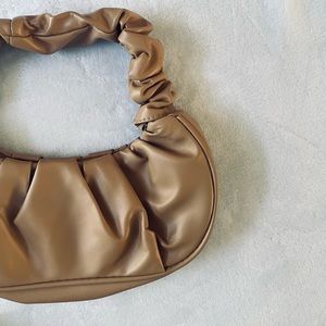 Brown ruffle bag